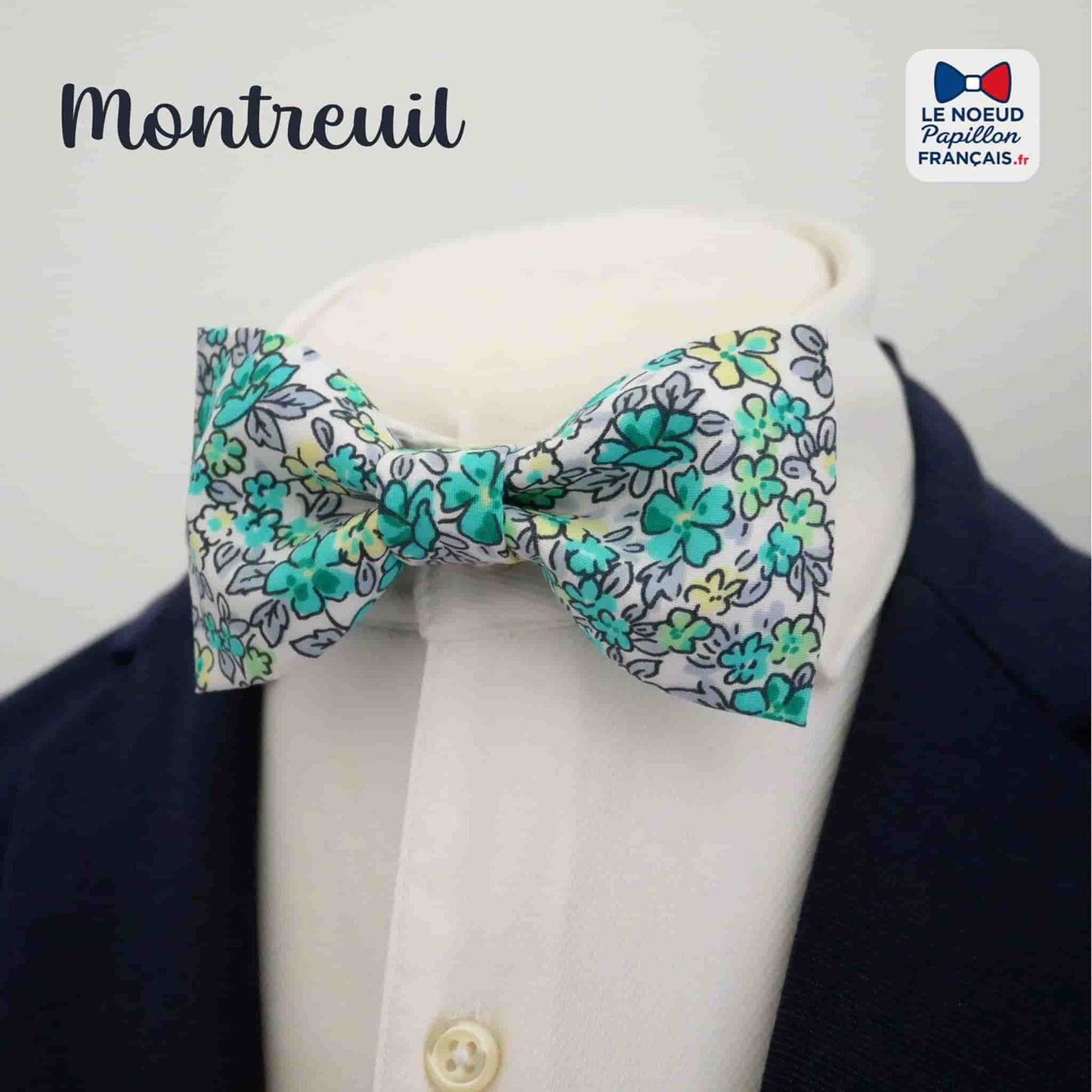 Noeud papillon vert fleuri